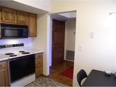 View of the kitchen looking into the entrance hall