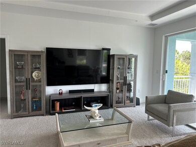 Living area featuring carpet flooring