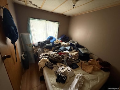 Bedroom featuring wood finished floors