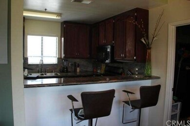 Kitchen has a breakfast bar for casual eating.