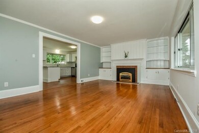 Beautifully restored original hardwoods and built-