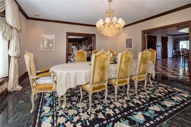 The banquet sized dining room is adjacent to the h