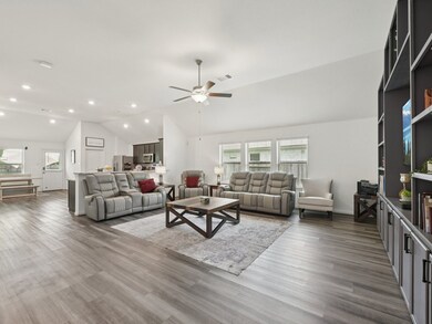 With gorgeous luxury vinyl flooring and high ceili