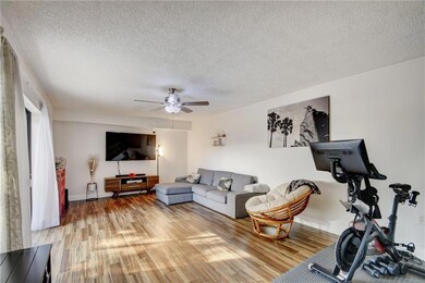 Living area has room for formal dining