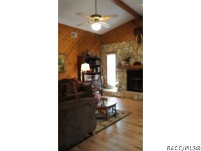 Same room, beamed ceiling