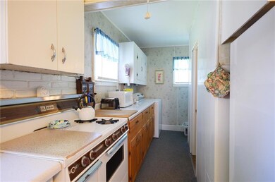 Galley kitchen with laundry