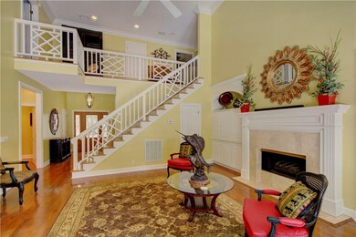 Living Room with Gas Log Fireplace with Access to