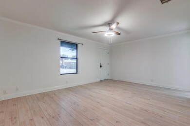 Living Room room with light hardwood / wood-style 