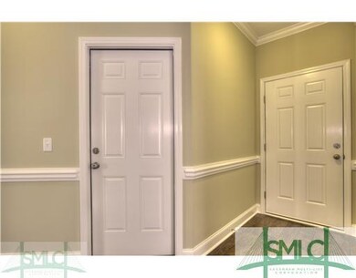 Foyer. Same plan previously constructed by same bu