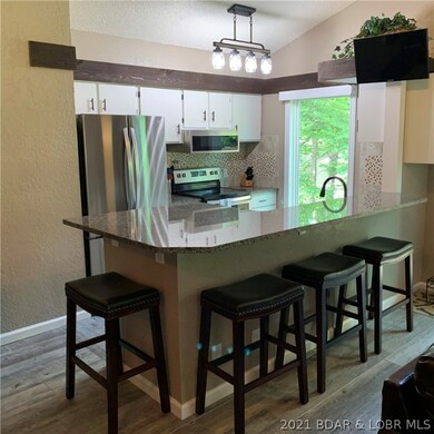 Granite countertops. Stainless steel appliances.