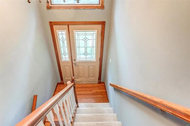 split-level entry down to the lower-level living room and up to the rest of the house