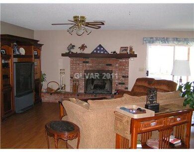 Living Room. Wood burning fireplace in great room