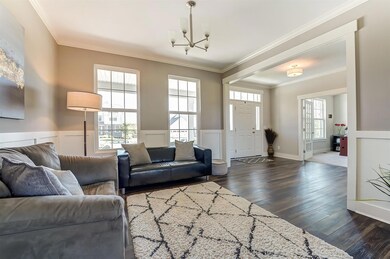 Spacious Formal Dining Room currently serving as sitting room.