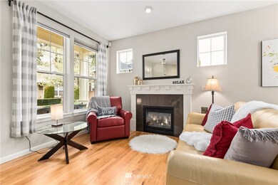 Desirable floor plan, light and bright living space with gas fireplace and rich oak hardwoods!