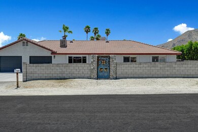 FRONT OF HOUSE WITH GATES MLS