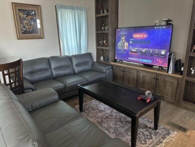 Living room featuring wood finished floors