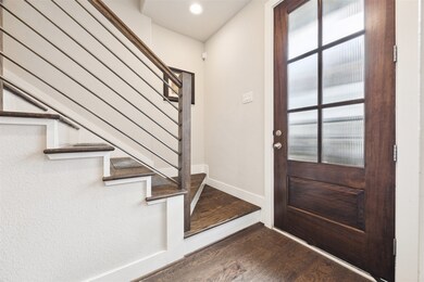 The gracious entry is full of natural light. Entry