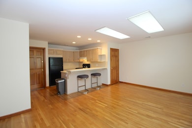 Kitchen opens to spacious LR.