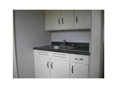 Mud Room. Just inside back door.
