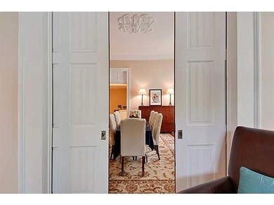 Dining Room. The original pocket doors are ideal f