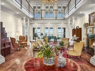 Gorgeous grand entry opens to the formal living ar