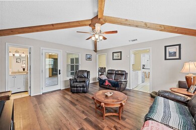 Vaulted ceilings with wood beams.