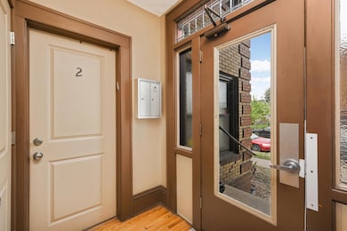 Secure and welcoming foyer with key-controlled entry and security cameras. This charming 4-unit building is self-managed with care and pride, offering peace of mind and a sense of community.