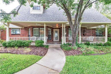Enjoy the large front porch with ceiling fans.