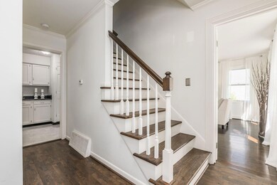 Entry with hardwood floor