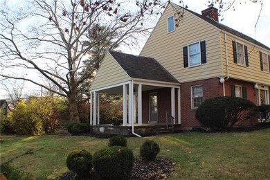 Side porch is off the large living room