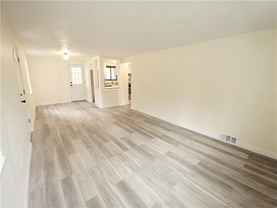 Step into the main living area with brand new floo