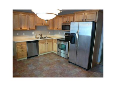 Front Exterior. Updated maple kitchen