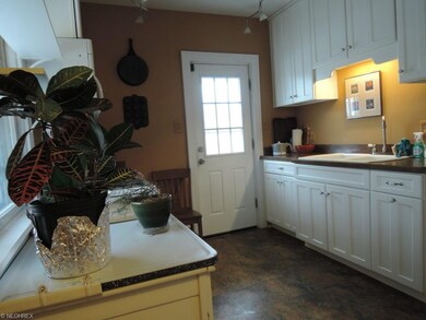 Another view of the kitchen looking toward the bac