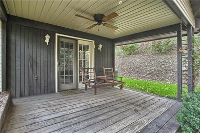 A wonderfully built porch off the side of the hous