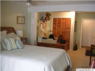 Large master bedroom with private bath and sitting area