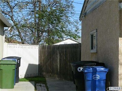 Side view, and entrance to back yard