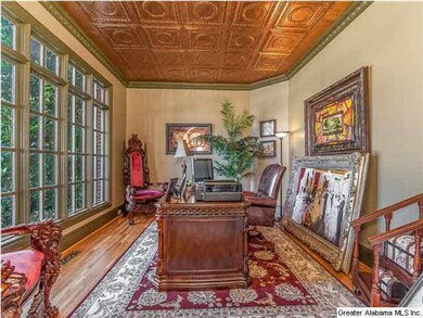 The Office features coffered/copper ceilings and t
