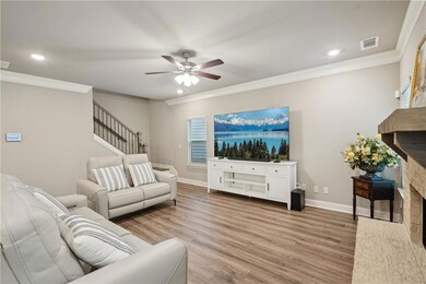 Living room with ceiling fan,woodstyle flooring .