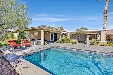Rear view of property featuring a patio, sunken BB