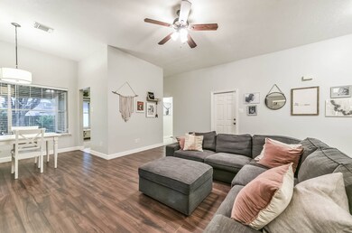 Right outside of the dining area through the doorway rests a lovely kitchen. Down the hallway lies two nicely sized bedrooms and a bathroom.