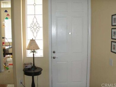 front door with beautiful custom glass window