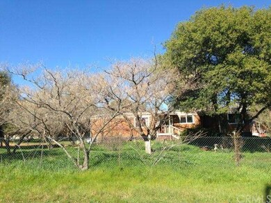 Fenced on three sides including around the home