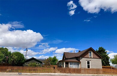 Oversized city lot, with cedar fencing.