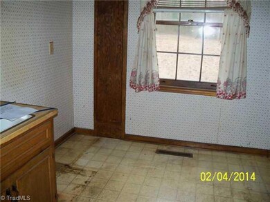 Laundry Room. Just off Kitchen.  Features laundry sink.