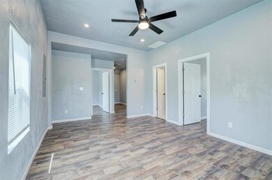 Unfurnished bedroom with recessed lighting, visibl
