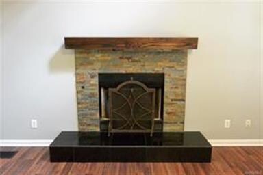 Stacked stone Wood burning fireplace.