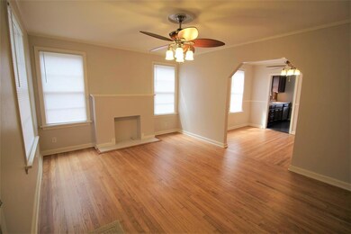 LIVING ROOM: Spacious living room. Decorative fire
