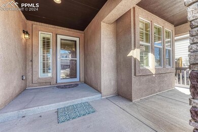 Doorway to property with a porch