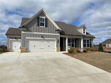 Added carriage house for storage and a golf cart