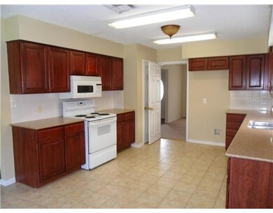 Kitchen. Cherry cabinets, granite counter tops and